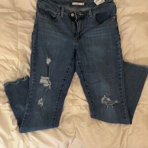 Levi's Medium Blue Distressed Ankle Jeans